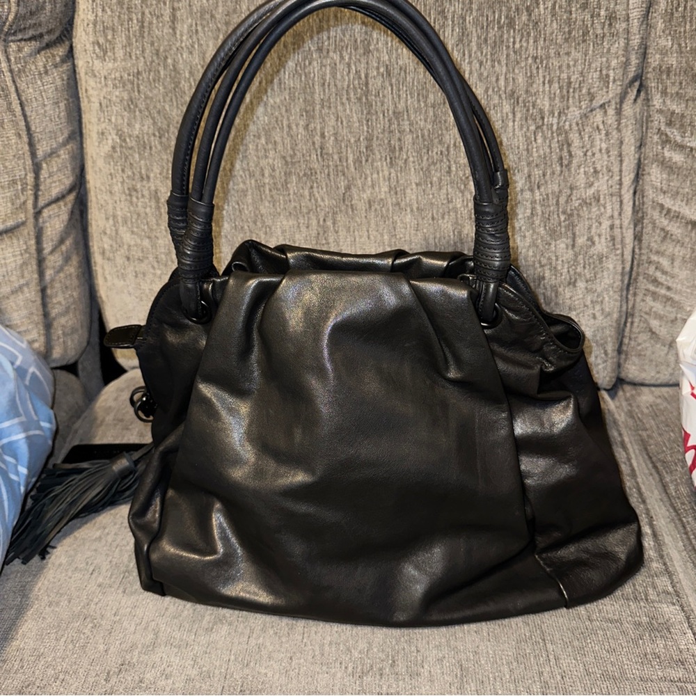 Women’s black leather L.a.m.b pure